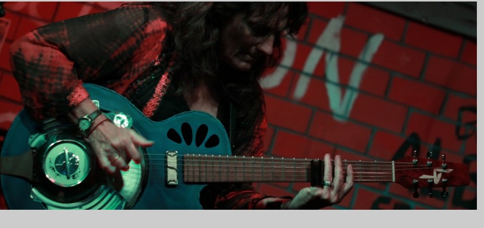 Her skillful command of the fretboard will impress every guitarist in the room. Her skillful command of the fretboard will impress every guitarist in the room.
